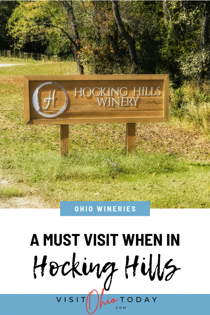 Picture of the hocking hills winery sign with text overlay saying a must visit when in hocking hills
