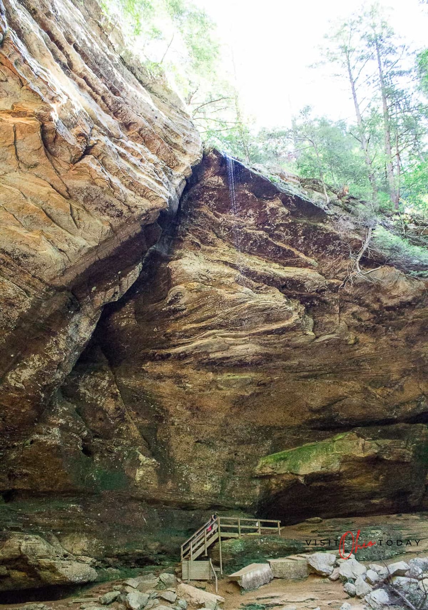 tall brown cave cliff looking area