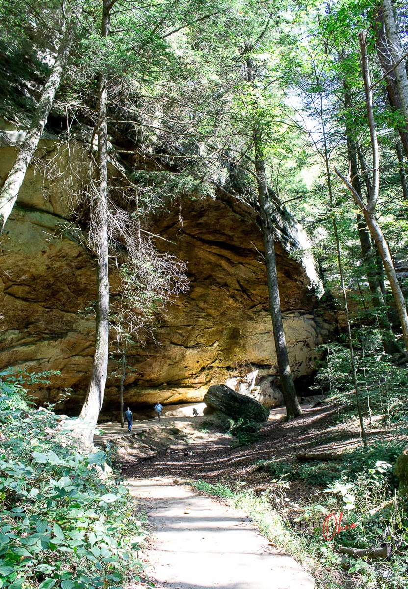brown cave with some green trees. Photo credit: Cindy Gordon of VisitOhioToday.com