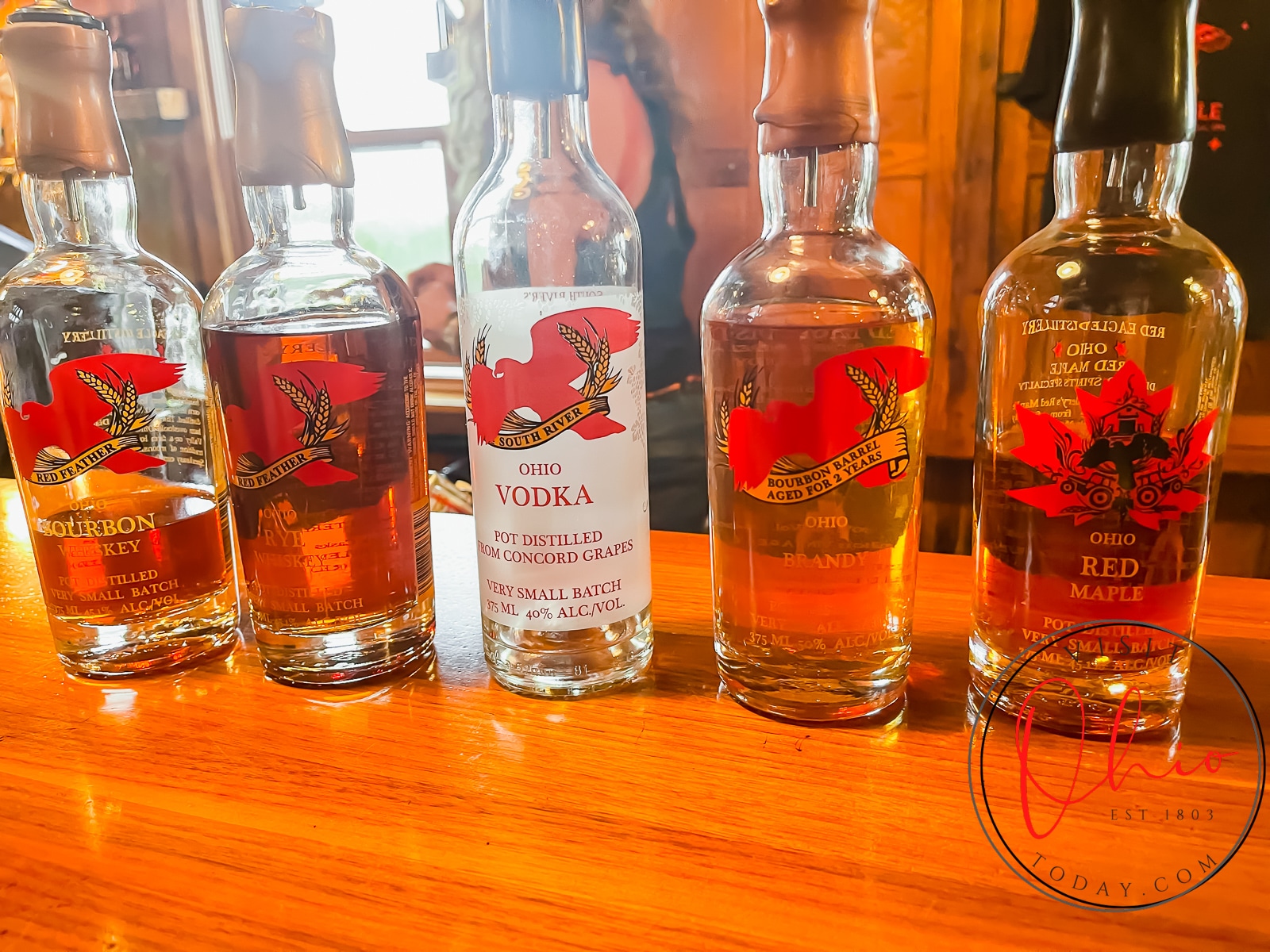 5 bottles of alcohol sitting on wooden bar counter Photo credit: Cindy Gordon of VisitOhioToday.com