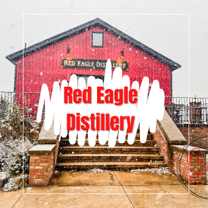 red eagle distillery in back ground with text overlay saying red eagle distillery