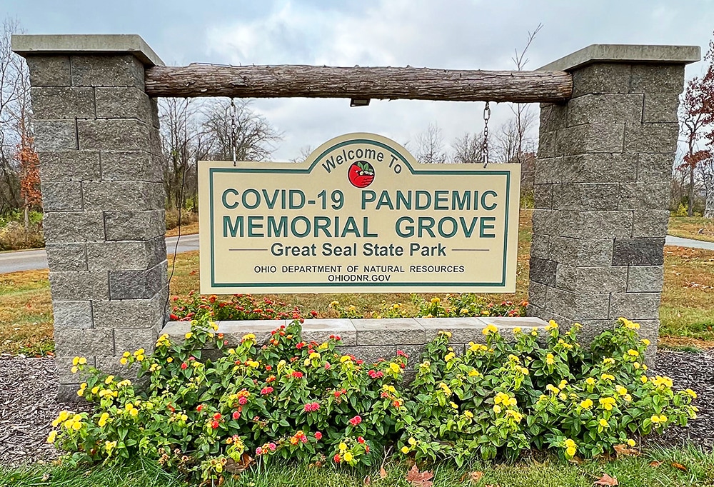 vertical image of the welcome sign for the Covid-19 Pandemic Memorial Grove at Great Seal State Park