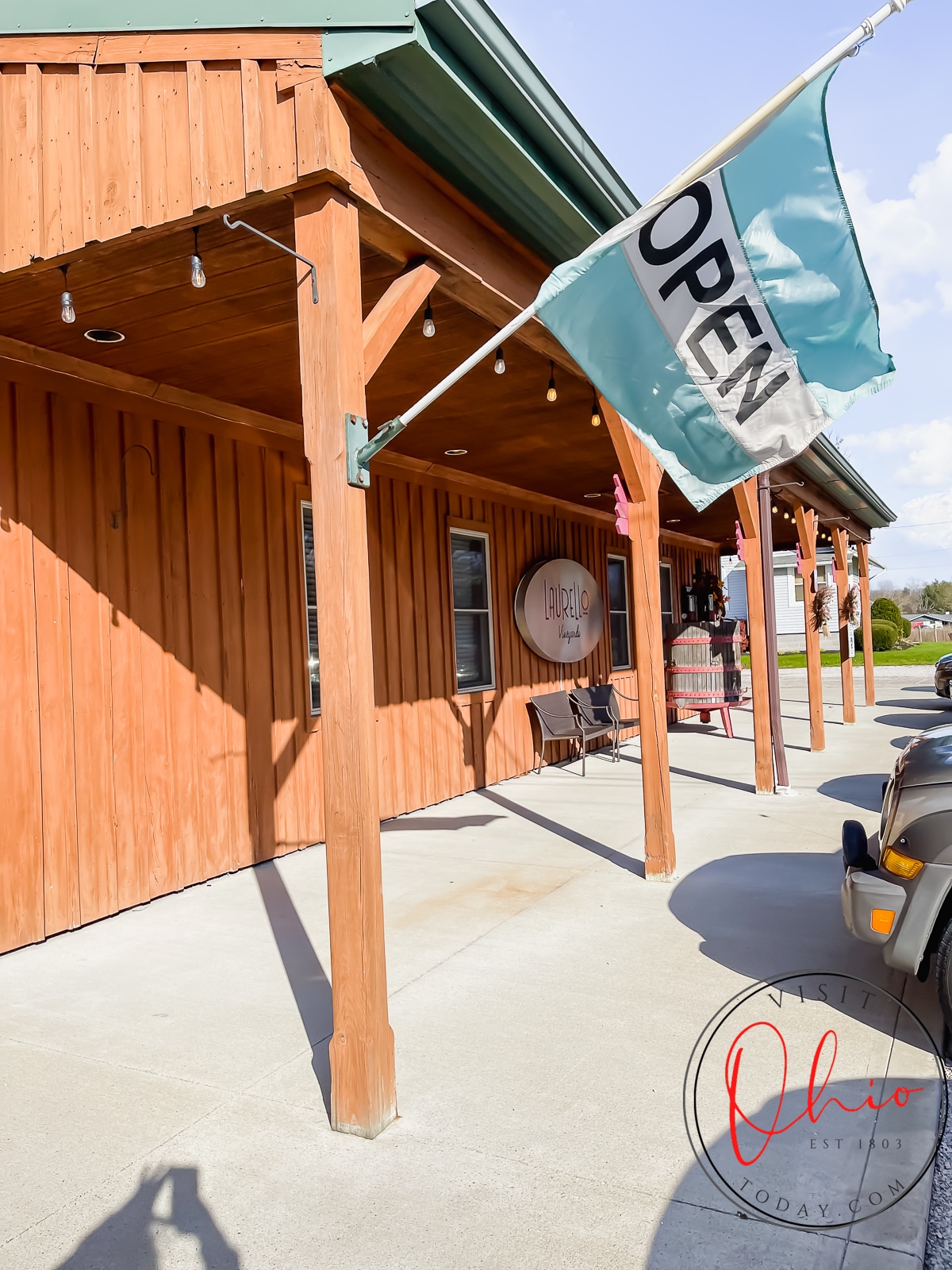 wooden building with green flag that says open Photo credit: Cindy Gordon of VisitOhioToday.com