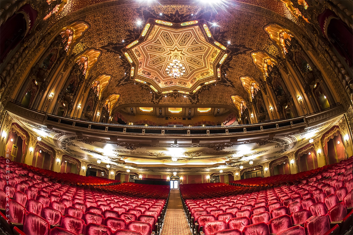 horizontal photo of the Renaissance Theatre in Mansfield taken with a fisheye lens, showing most of the auditorium