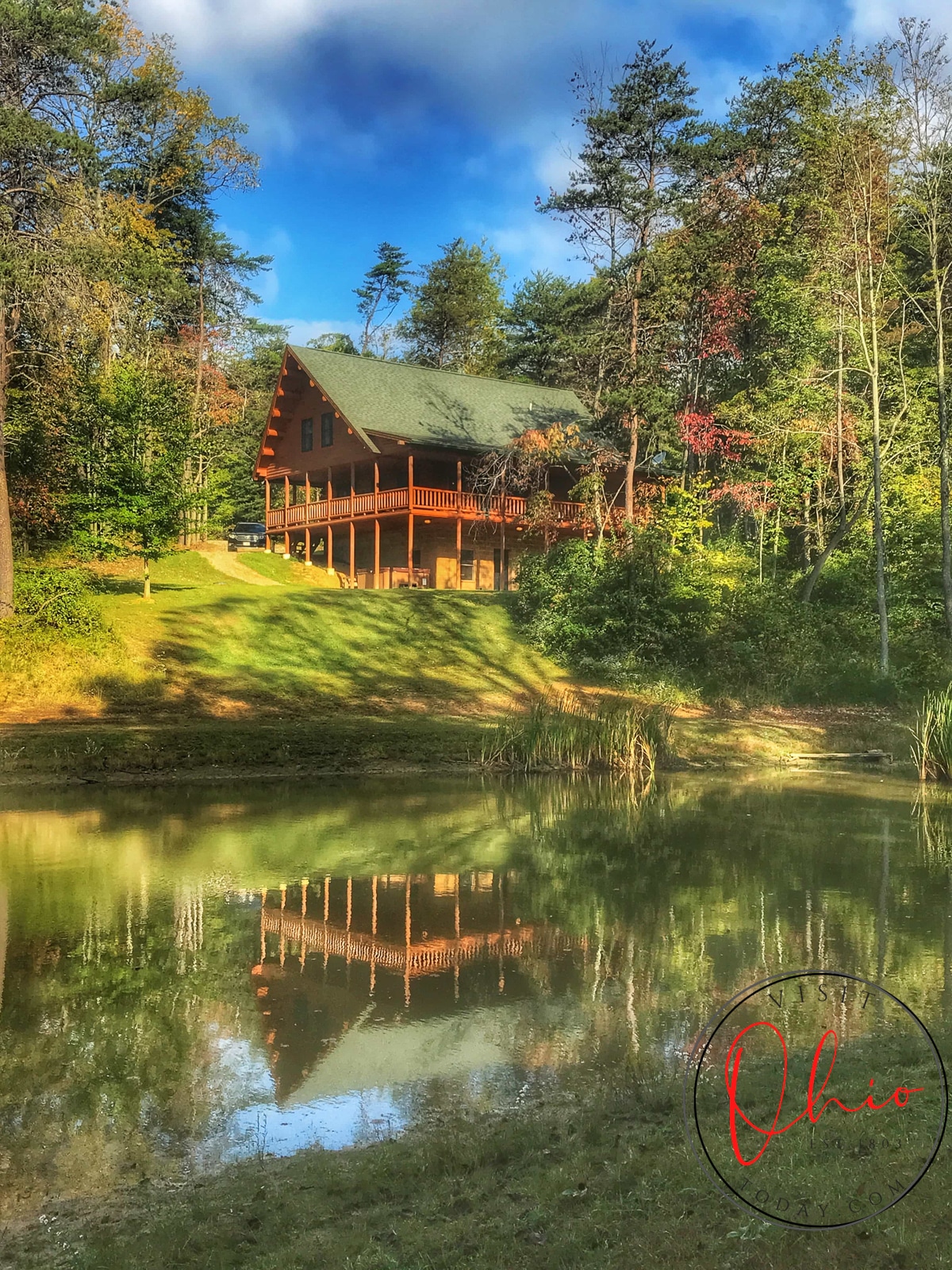 heavily edited picture of still water lodge cabin with greens and browns and the reflection in a pond Photo credit: Cindy Gordon of VisitOhioToday.com