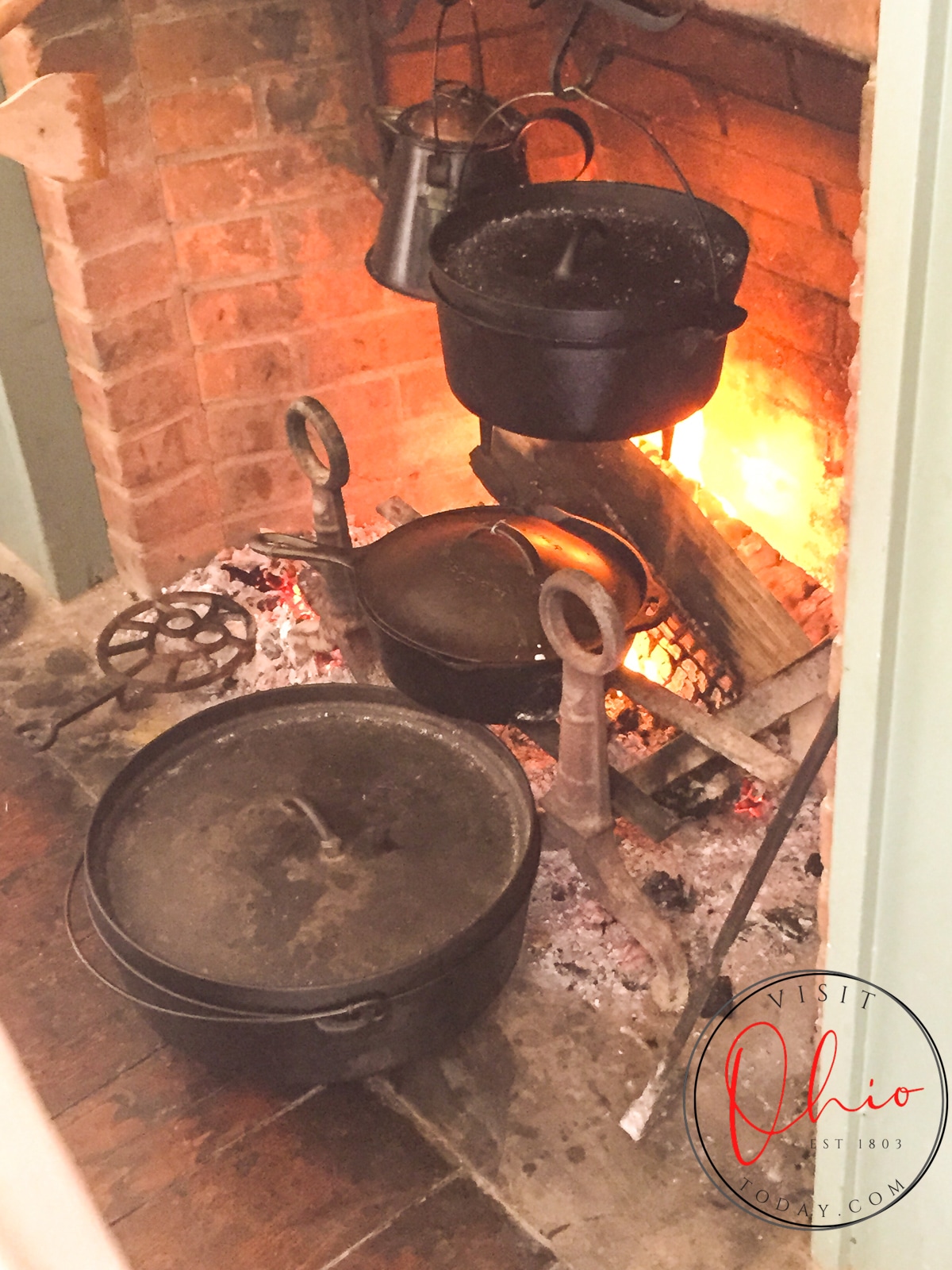 cast iron pots on racks in fireplace at ohio village Photo credit: Cindy Gordon of VisitOhioToday.com