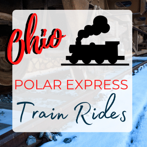 Bottom of a rusty train wheel on a rusty track with text overlay: ohio polar express train rides