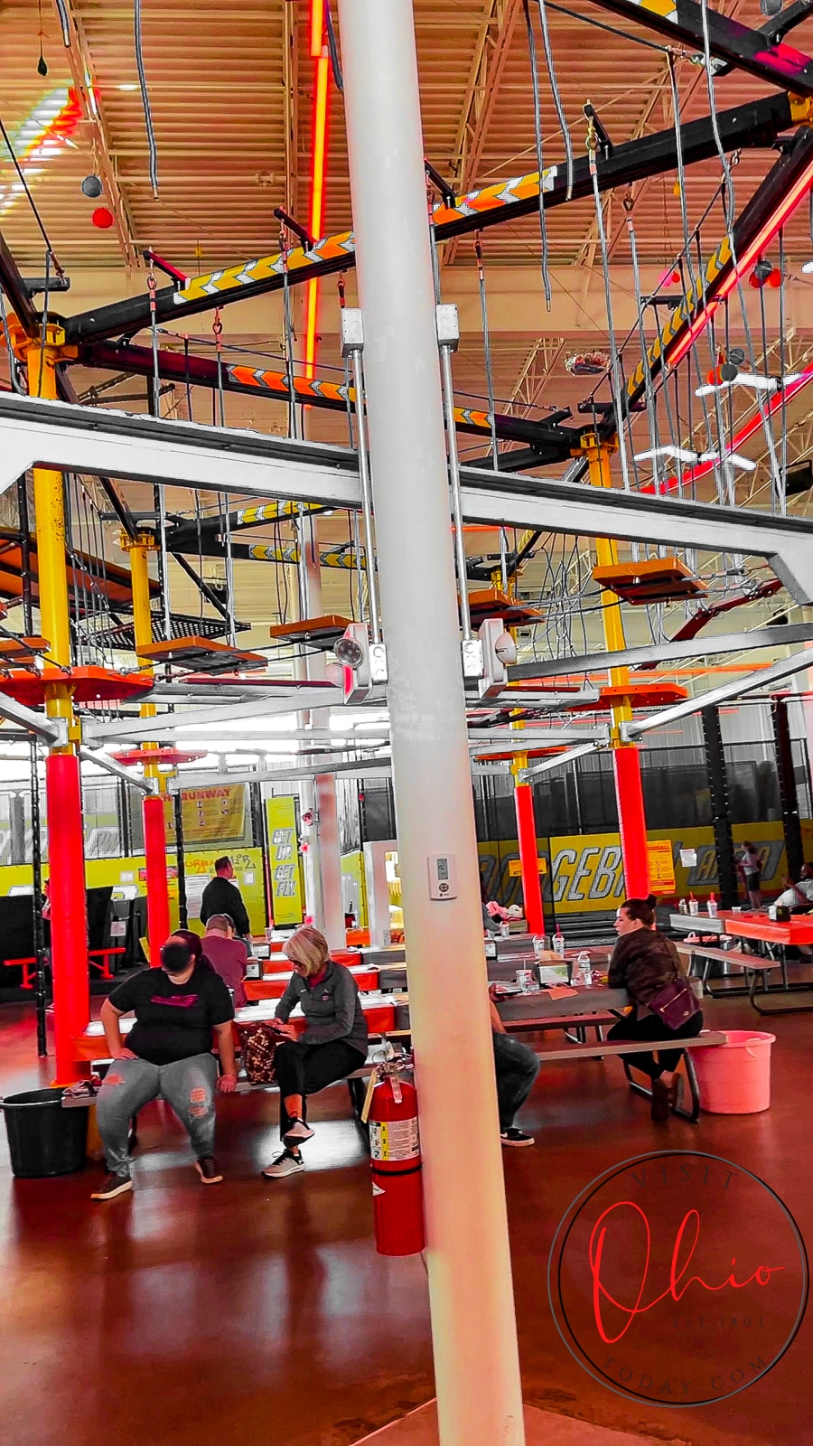 multi color ropes course with parents sitting underneath at picnic tables Photo credit: Cindy Gordon of VisitOhioToday.com