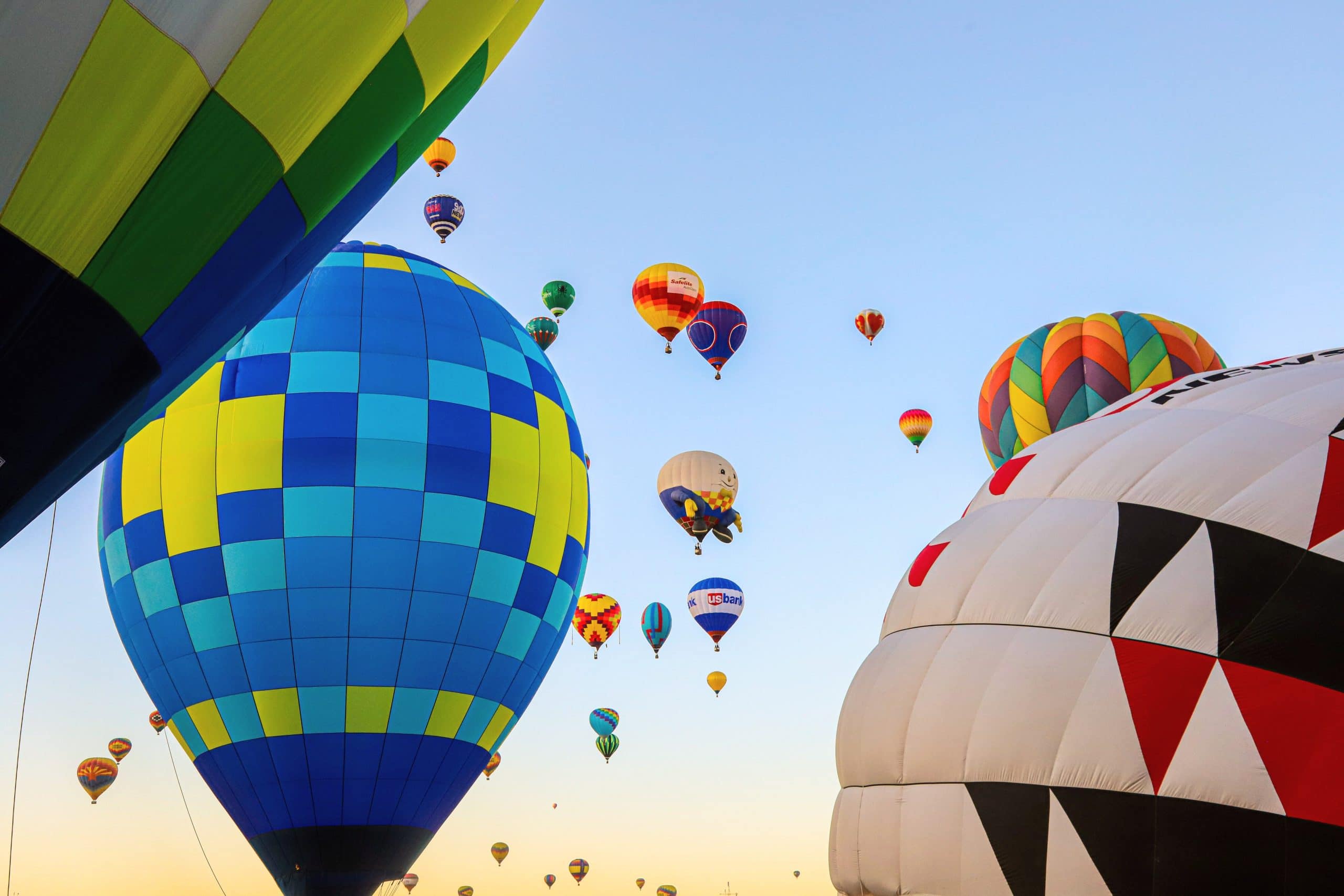 Various coloured hot air balloons in flight