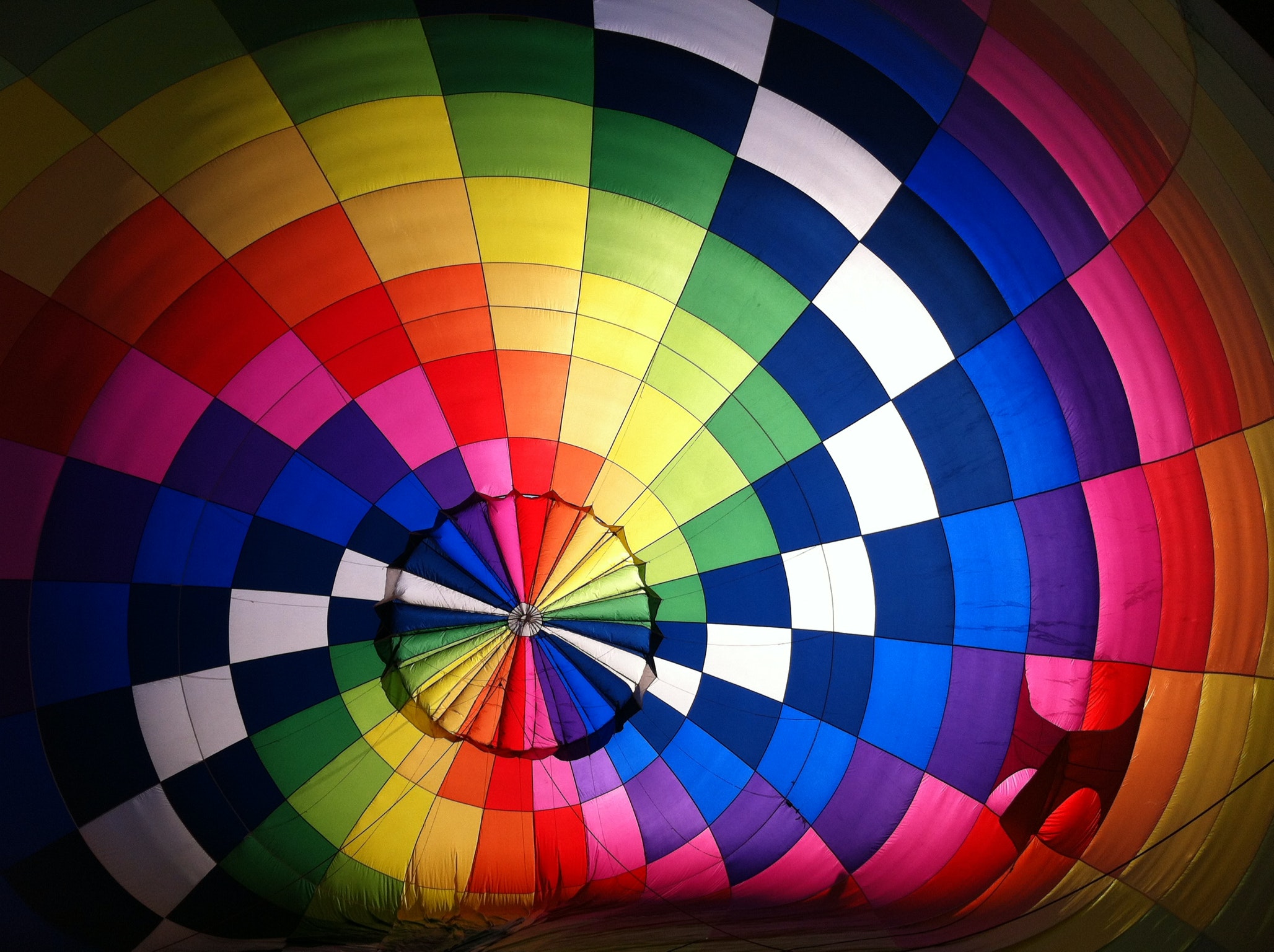 The inside of a colourful hot air balloon