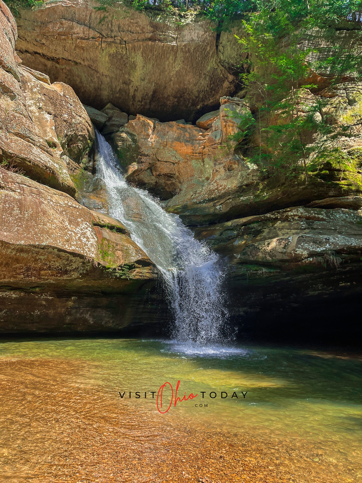 unobstructed view of cedar falls waterfall, water flowing down rocks into a clear pool Photo credit: Cindy Gordon of VisitOhioToday.com
