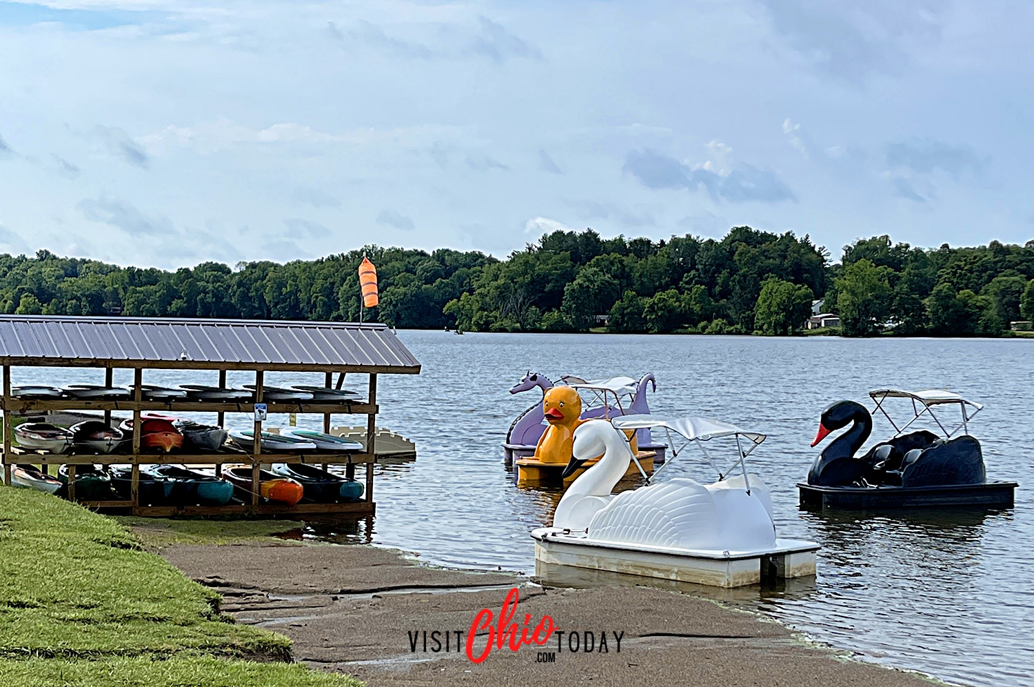 horizontal photo of the pedal boats on the water and other watercraft on the marina. Photo credit: Cindy Gordon of VisitOhioToday.com
