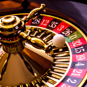 A vclose up image of a roulette wheel with a white ball