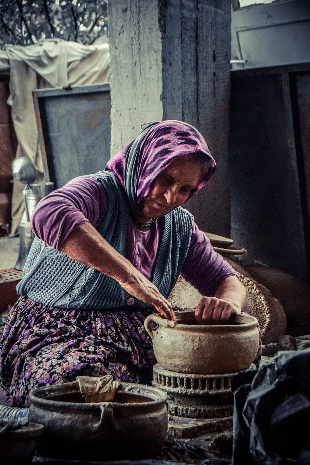 A lady creating handmade pottery