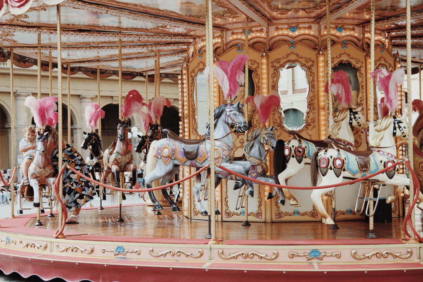 A traditional carousel ride with horses