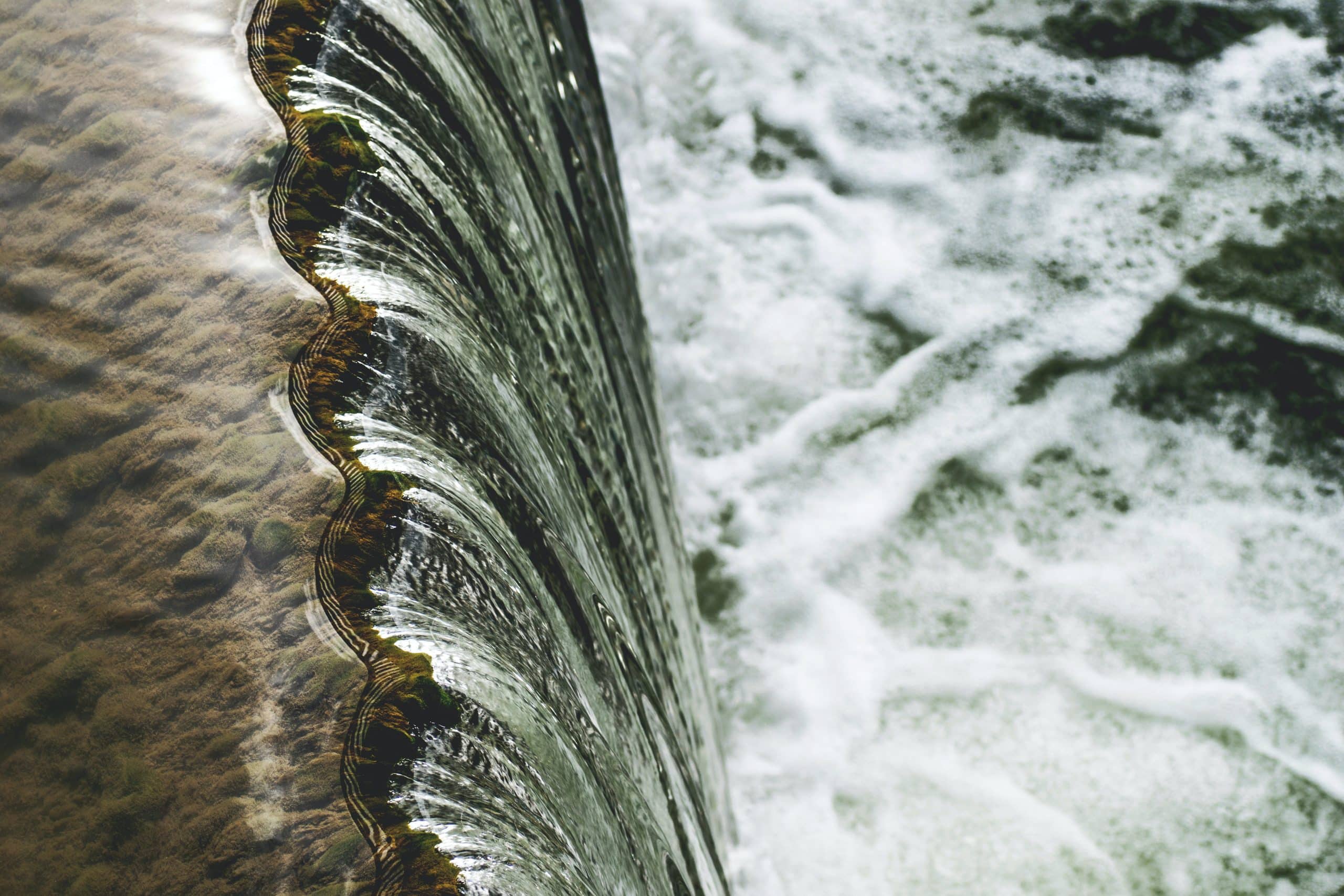 Water flowing downwards from a dam