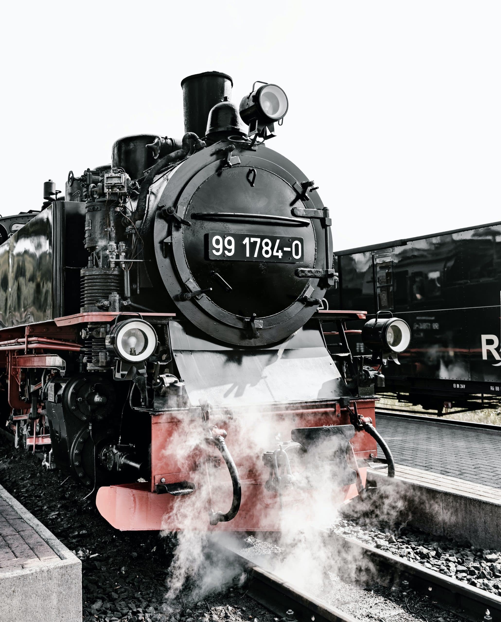 A close up photo of a steam train