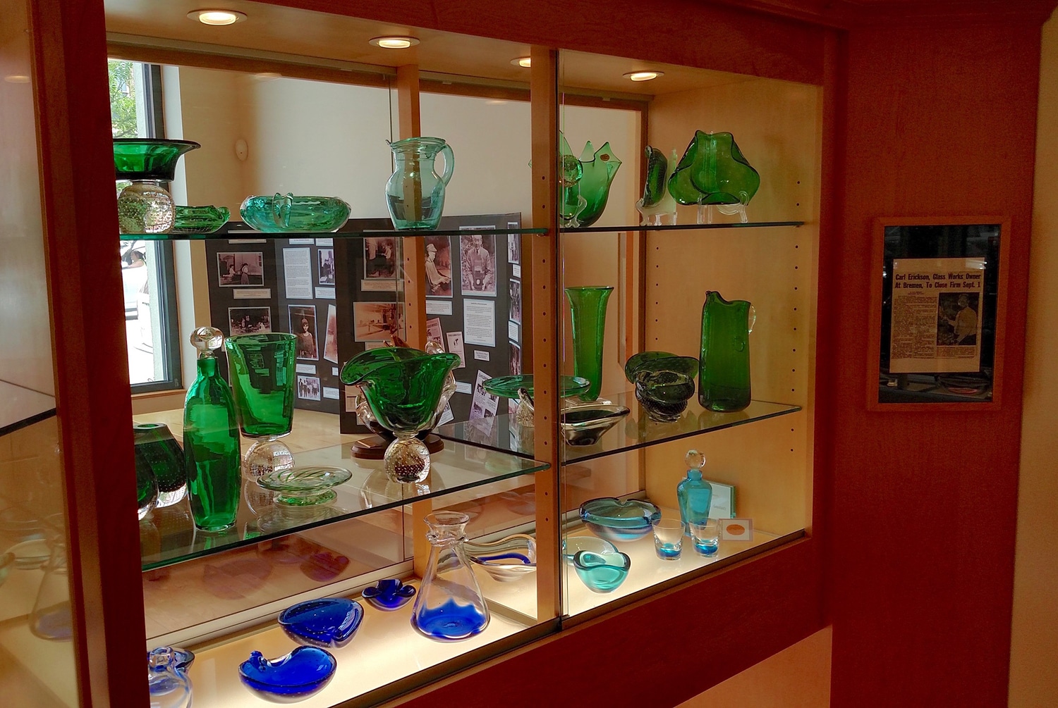 horizontal photo showing the green ericson display at the ohio glass museum - things to do in lancaster ohio
