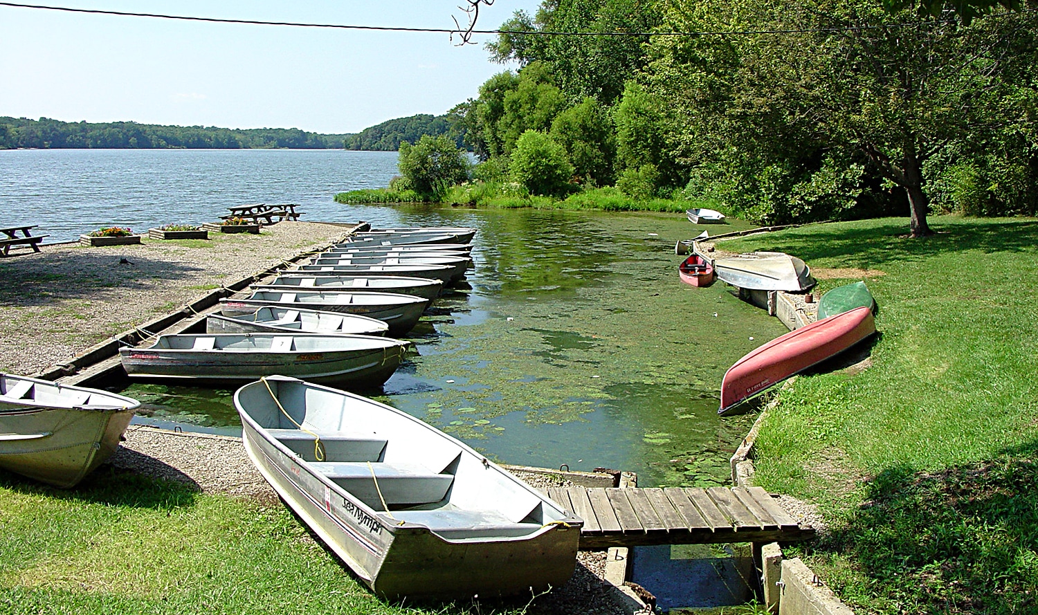 horizontal photo of rentable boats at the marina at Kiser Lake State Park