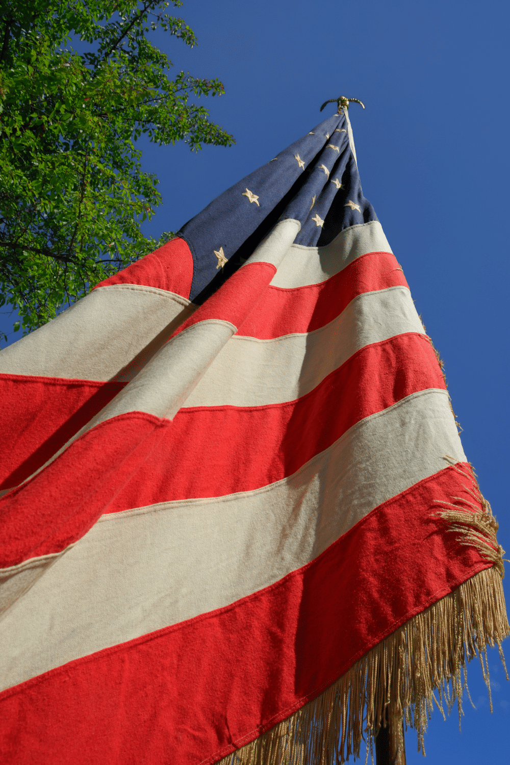 A vertical photo of an American flag