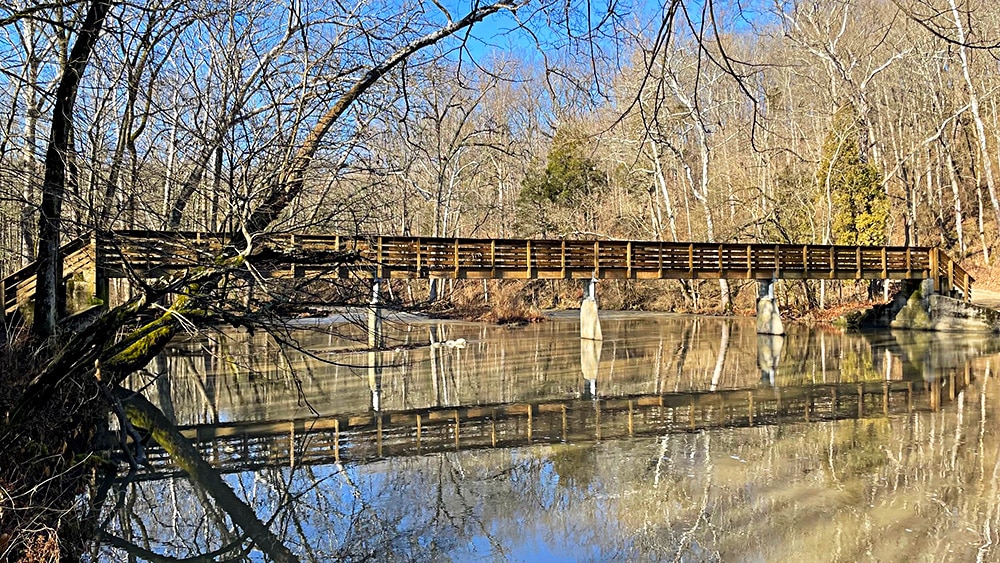 horizontal photo of a bridge across the river at John Bryan State Park Ohio