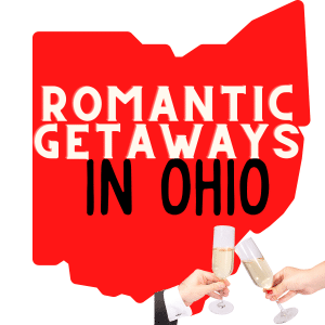 A red image of the Ohio map silhouette with a text overlay saying romantic getaways in ohio. An image of two hands toasting champagne glasses is in the bottom right of the image
