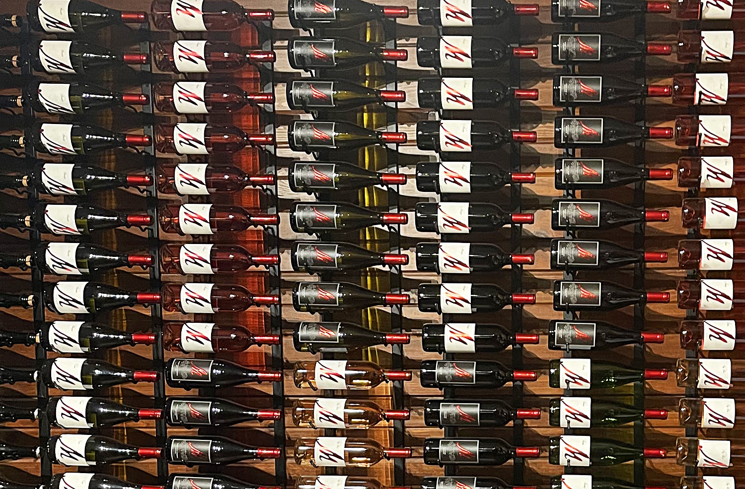 horizontal photo of stored and displayed bottles of wine at M Cellars. Photo credit: Cindy Gordon of VisitOhioToday.com