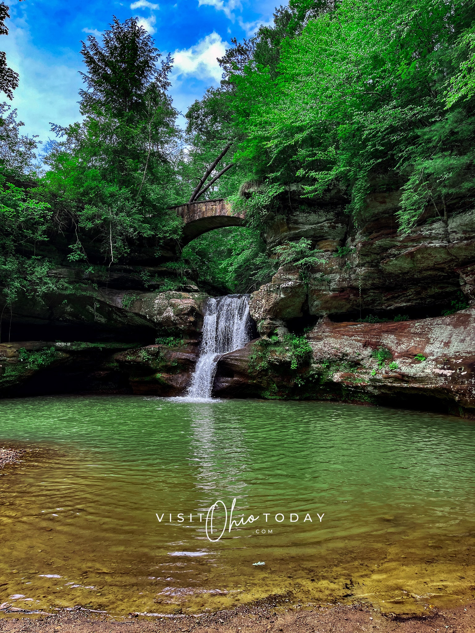 vertical photo of one of the waterfalls along the Old Man’s Cave trail. Photo credit: Cindy Gordon of VisitOhioToday.com