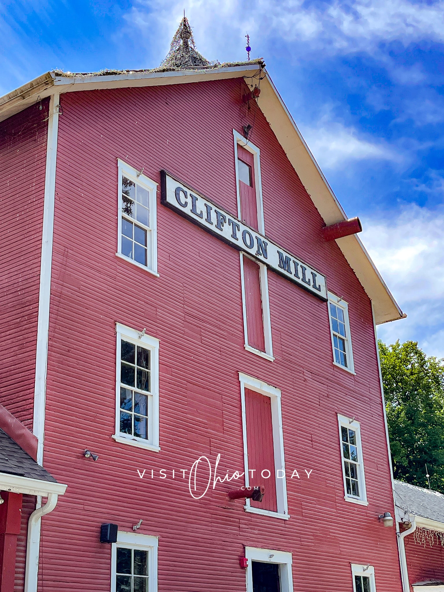 vertical photo showing the front of the main clifton mill building Photo credit: Cindy Gordon of VisitOhioToday.com