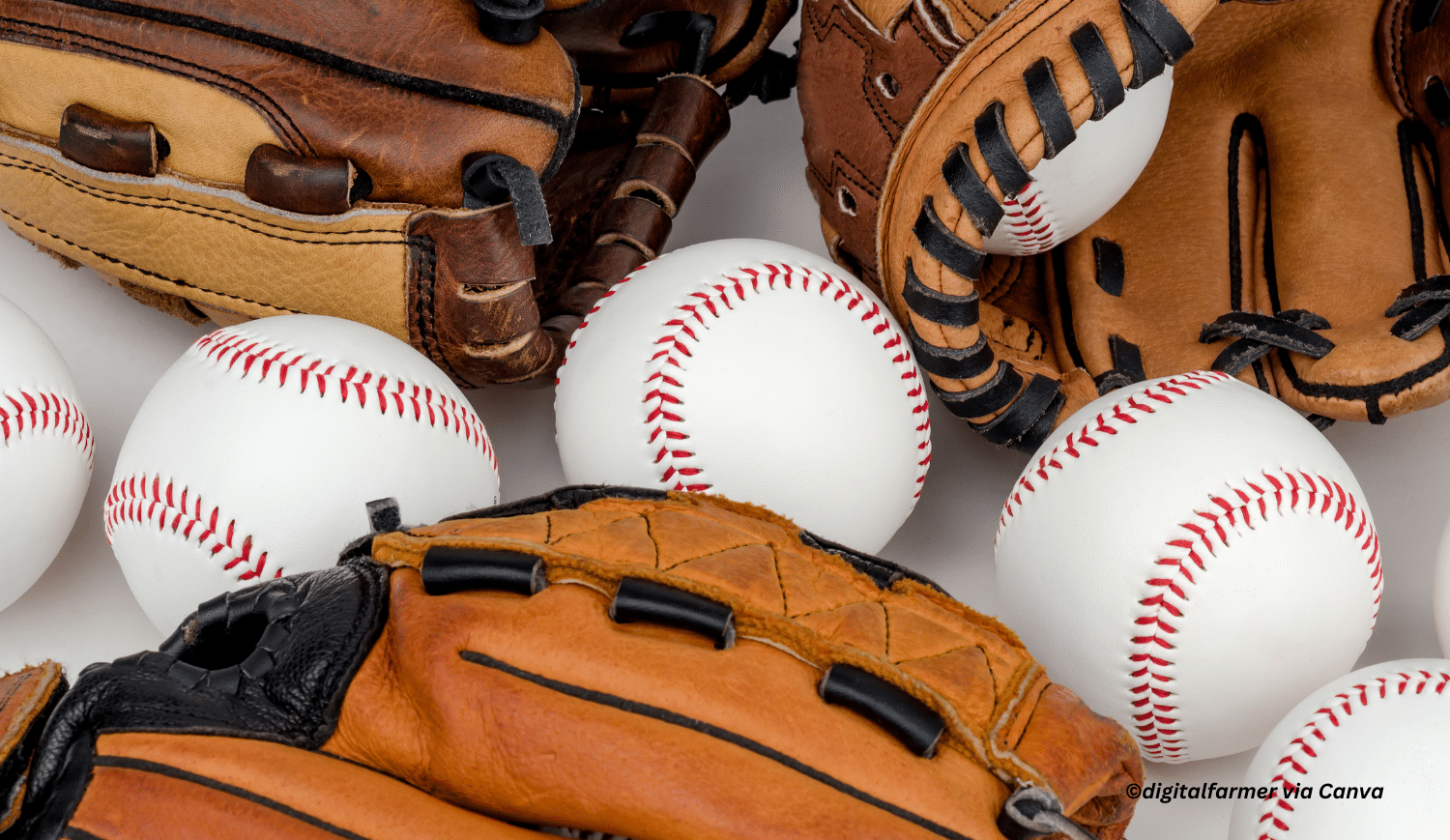 horizontal photo of some baseball balls and gloves