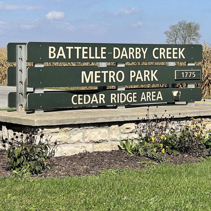 square photo of the entrance sign to battelle darby creek metro park - cedar ridge area