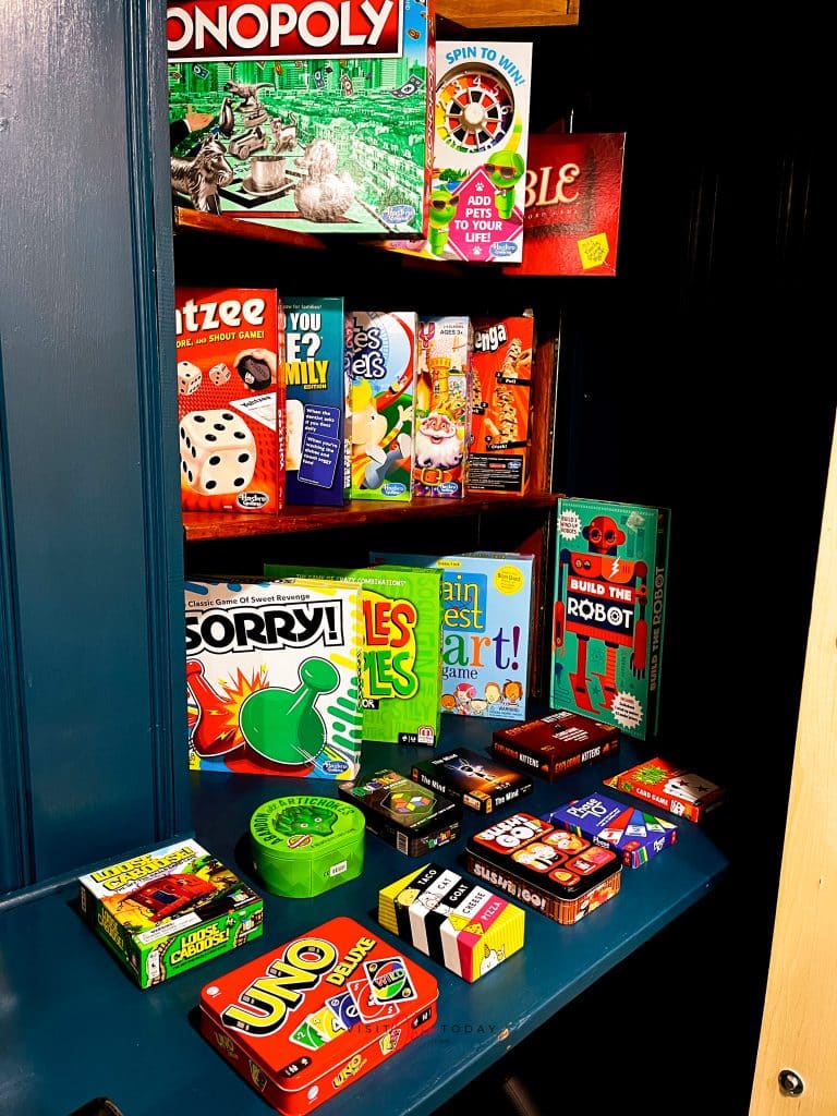 4 level game shelf with colorful games