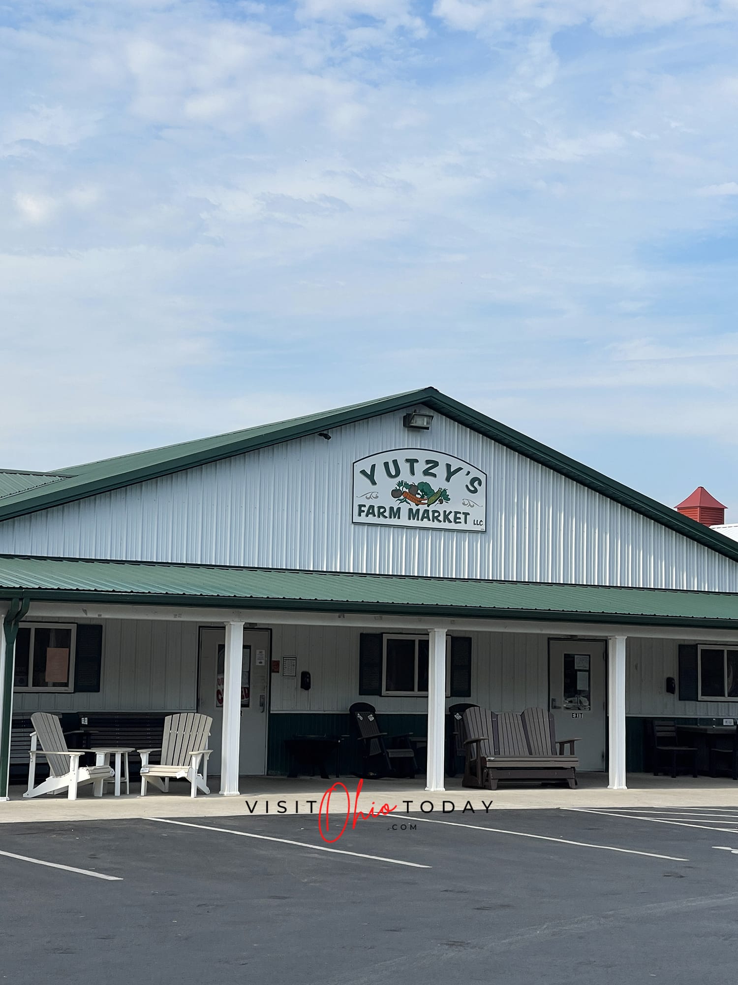 vertical photo showing the front of yutzis farm market store with garden furniture on display in the terrace area at the front of the store Photo credit: Cindy Gordon of VisitOhioToday.com