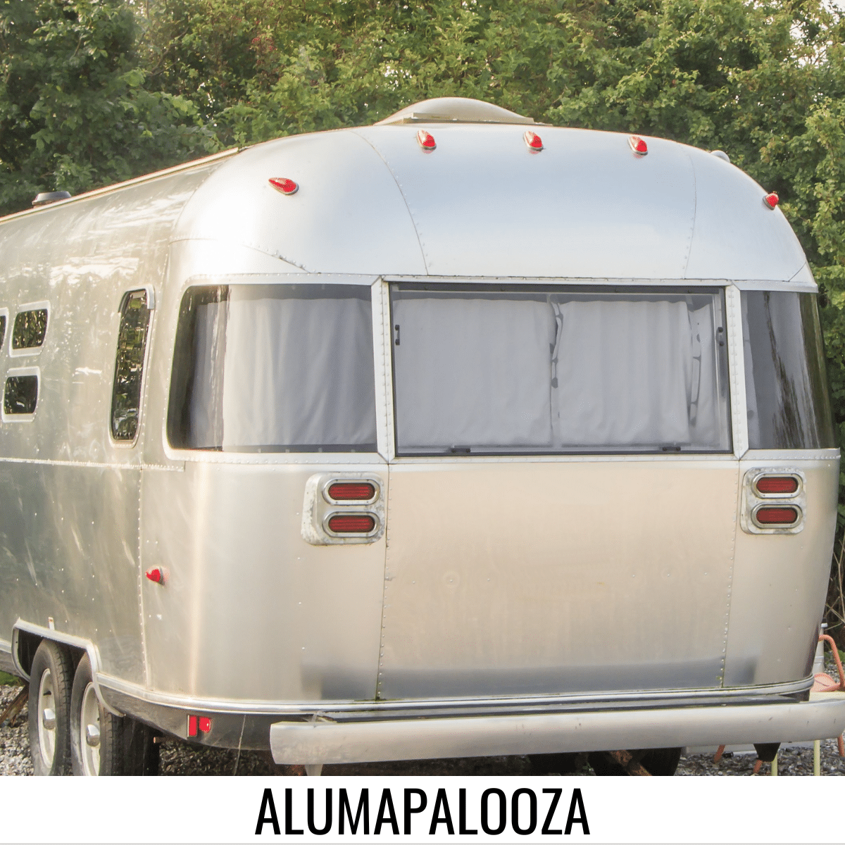 square image with a photo of the rear view of an Airstream RV camper with trees in the background. A white strip at the bottom has the text Alumapalooza. Image via Canva pro license