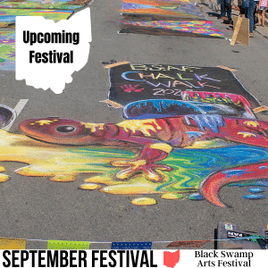 square image with a photo of the work of a professional chalk artist - a chalk drawing of a lizard. Image courtesy of Black Swamp Arts Festival