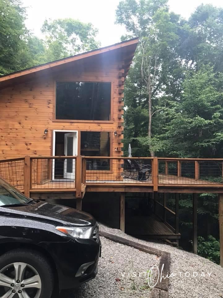 sideview of a wooden log cabin with slanted roof Photo credit: Cindy Gordon of VisitOhioToday.com