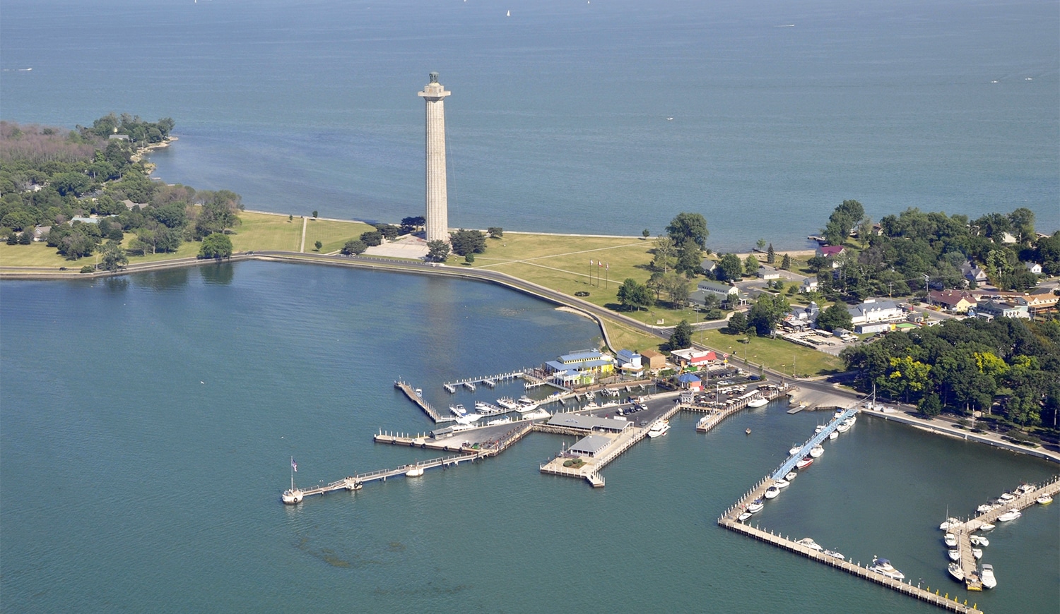 horizontal aerial photo of the put in bay harbor area, including Perry's monument, and clearly shows the isthmus that it stands on. Image via Canva pro license