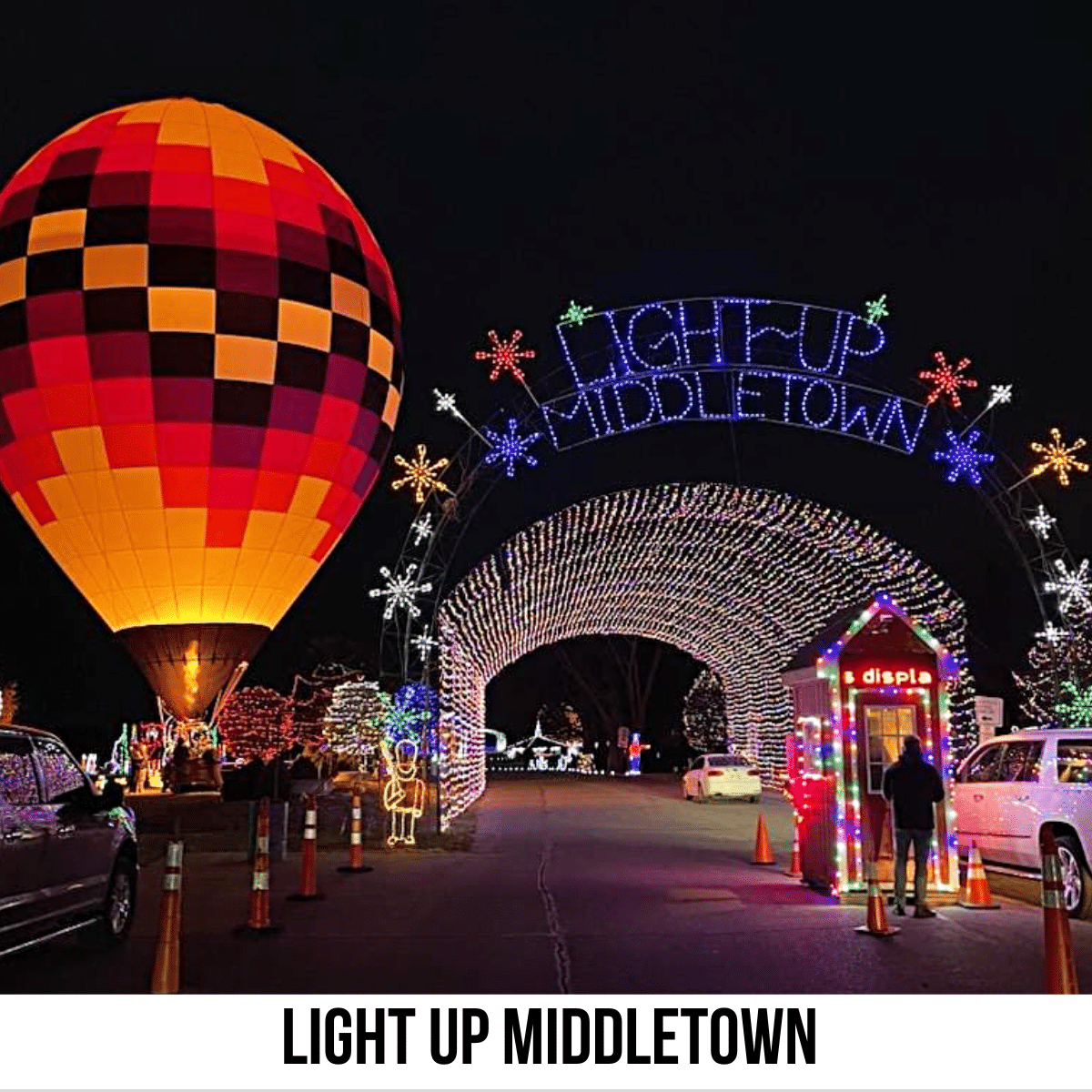 square image with a phot of Light Up Middletown entrance with a lit tunnel and a glowing hot air balloon. Image courtesy of Light Up Middletown