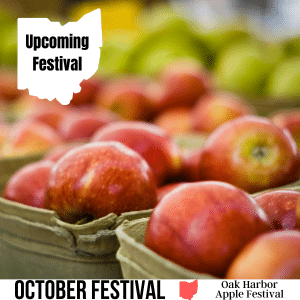 square image with a photo of boxes of red apples. A white strip at the bottom has the text October Festival Oak Harbor Apple Festival. Image via Canva pro license
