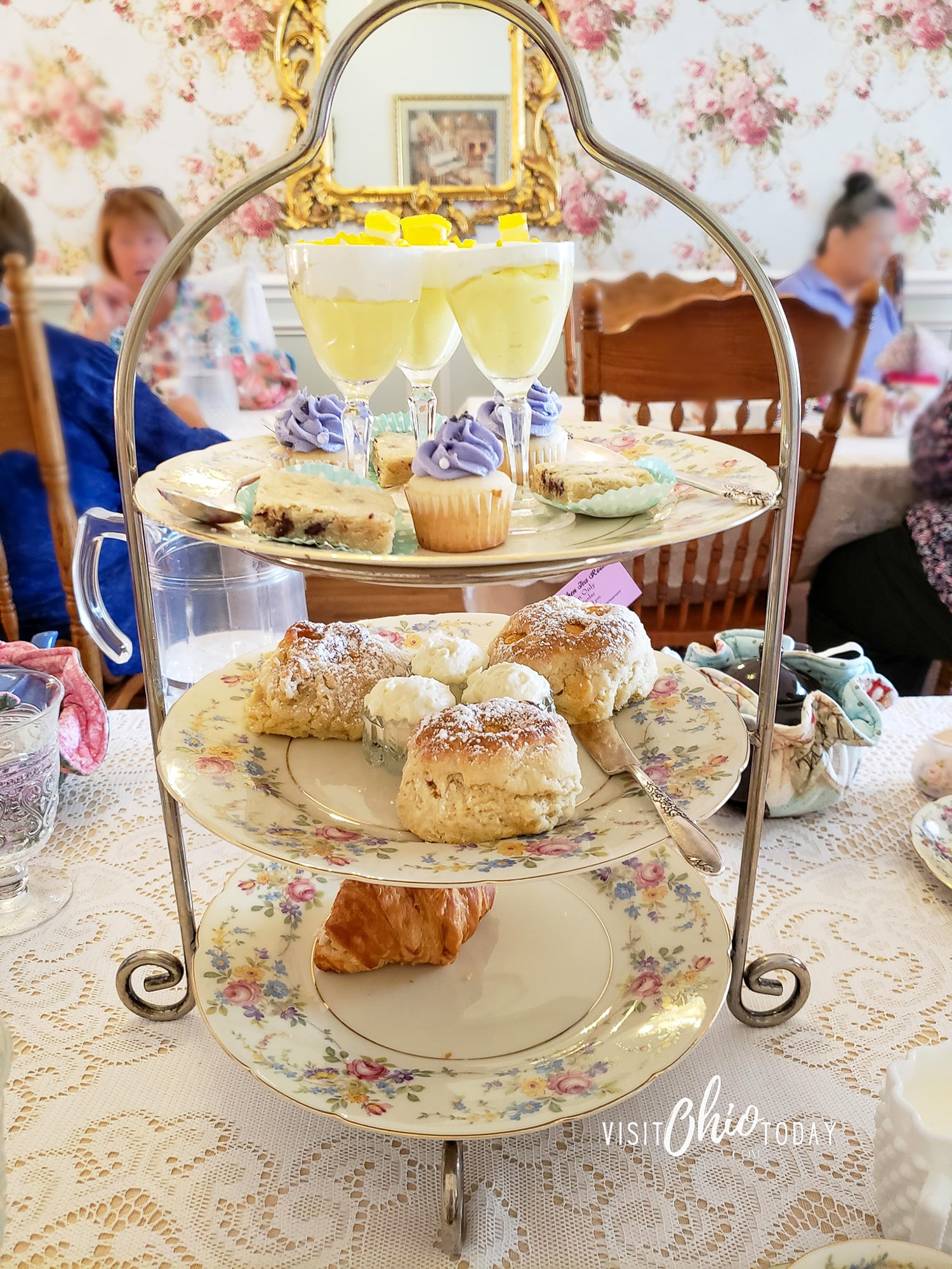 horizontal photo of an afternoon tea on a three-tiered plate stand with scones, cakes, pastries and desserts. Photo credit: Cindy Gordon of VisitOhioToday.com