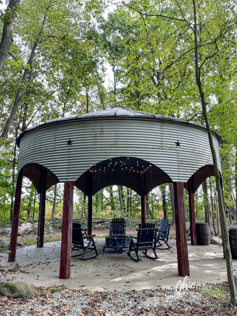 silo made into a gazebo with some big wooden chairs and fire pit inside. photo credit: Cindy Gordon of VisitOhioToday.com