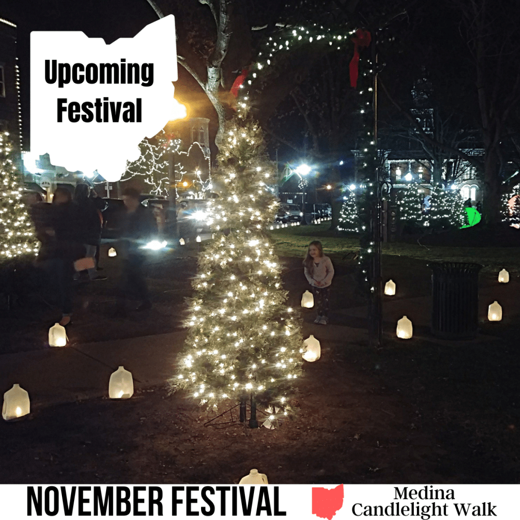 square image with a photo of lit Christmas trees and displays along the walk. A white strip across the bottom has the text November Festival Medina Candlelight Walk