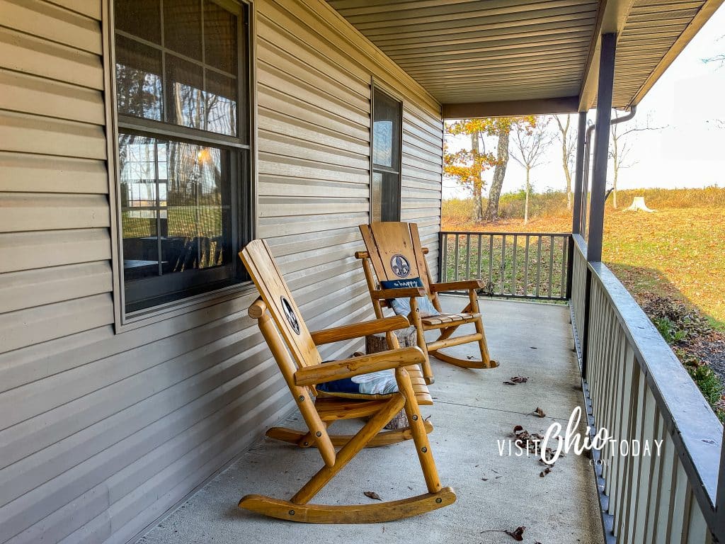 front porch of a house with two wooden rocking chairs Photo Credit Cindy Gordon of VisitOhioToday.com