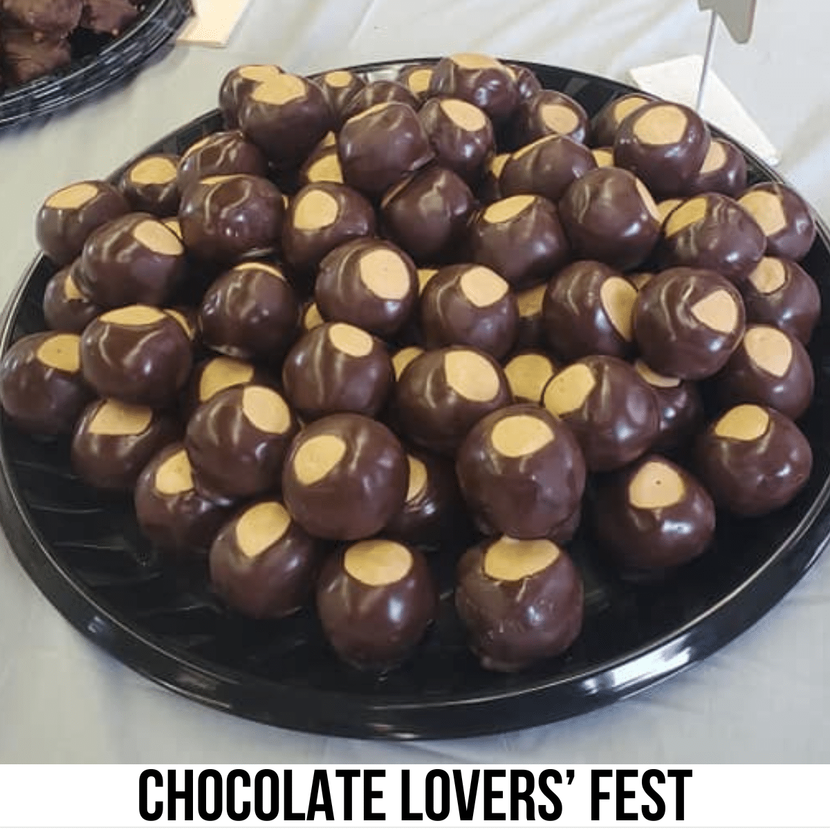 A square image with a photo of a platter of buckeye candies. A white strip across the bottom says Chocolate Lovers' Fest.