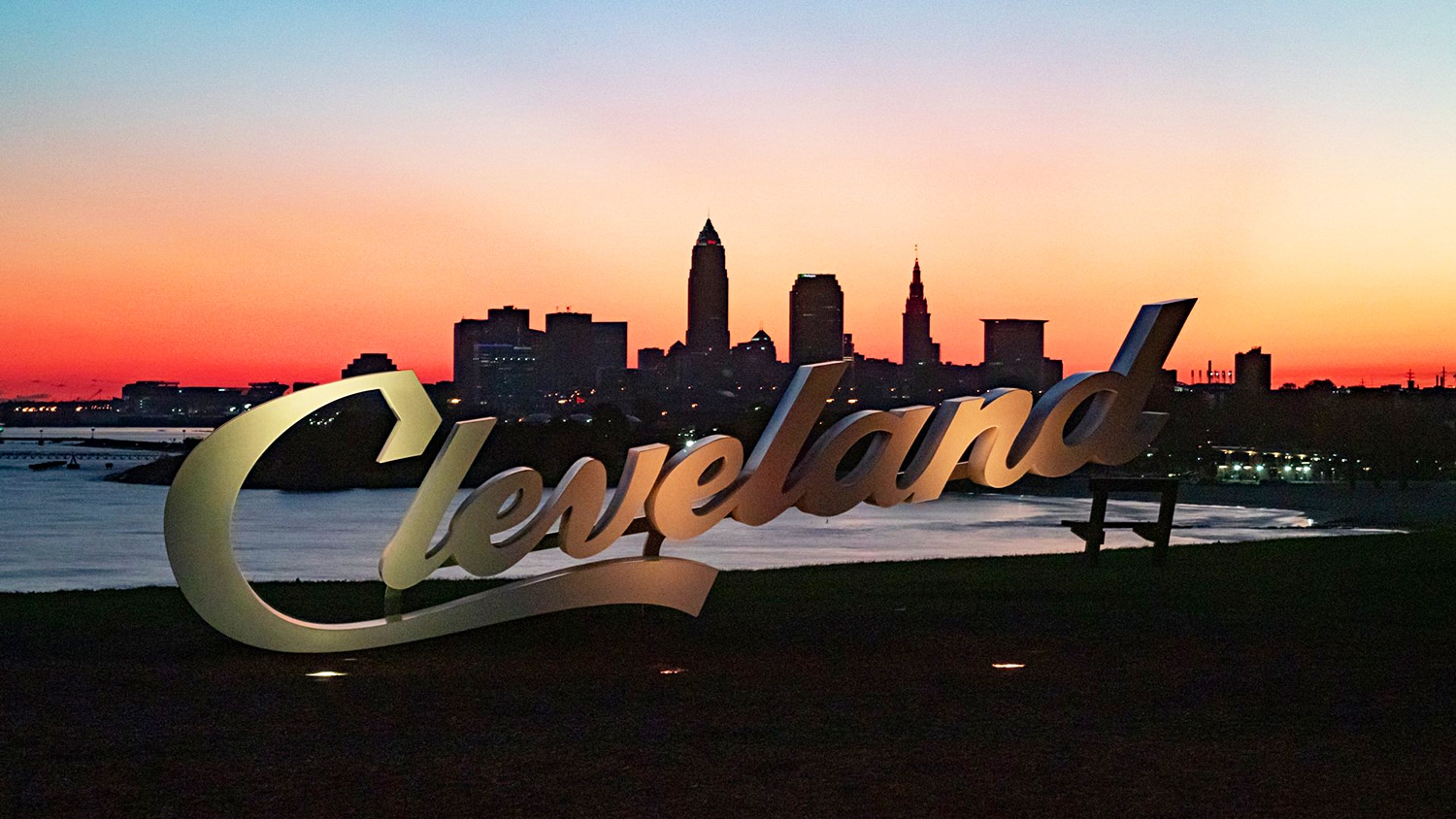 horizontal photo of a Cleveland Script Sign at sunset