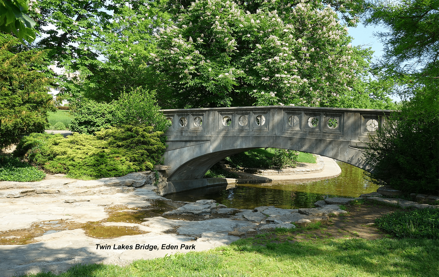horizontal photo of the bridge over twin lakes at Eden Park Cincinnati