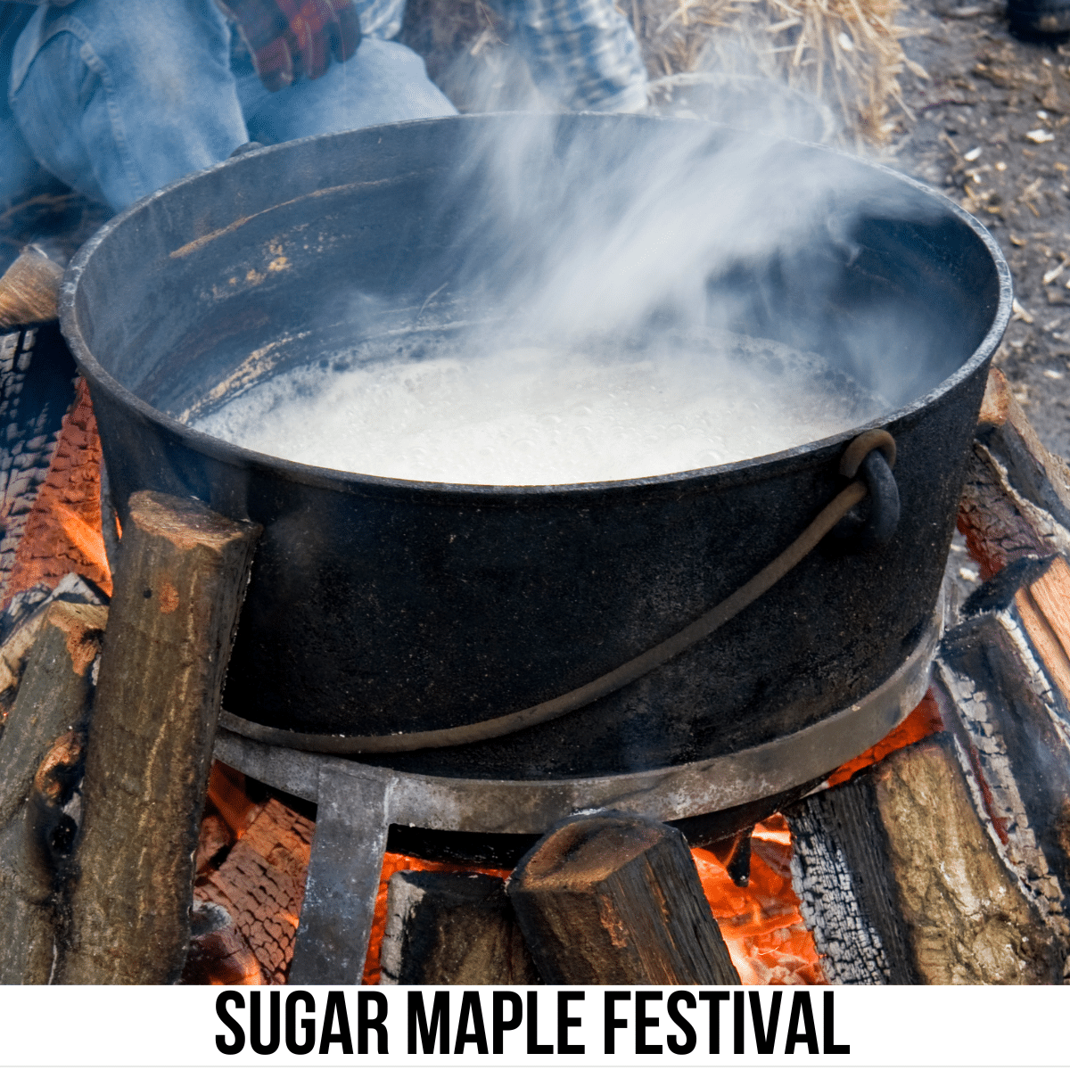 A square image of a photo of a large, steaming cast iron container over wood on a fire. A white strip at the bottom has text Sugar Maple Festival.