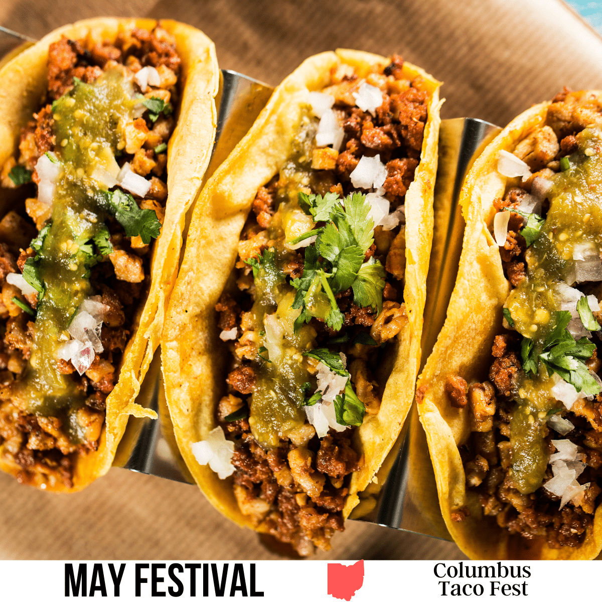 A square image of a photo looking down on three tacos. A white strip across the bottom has text May Festival Columbus Taco Fest.