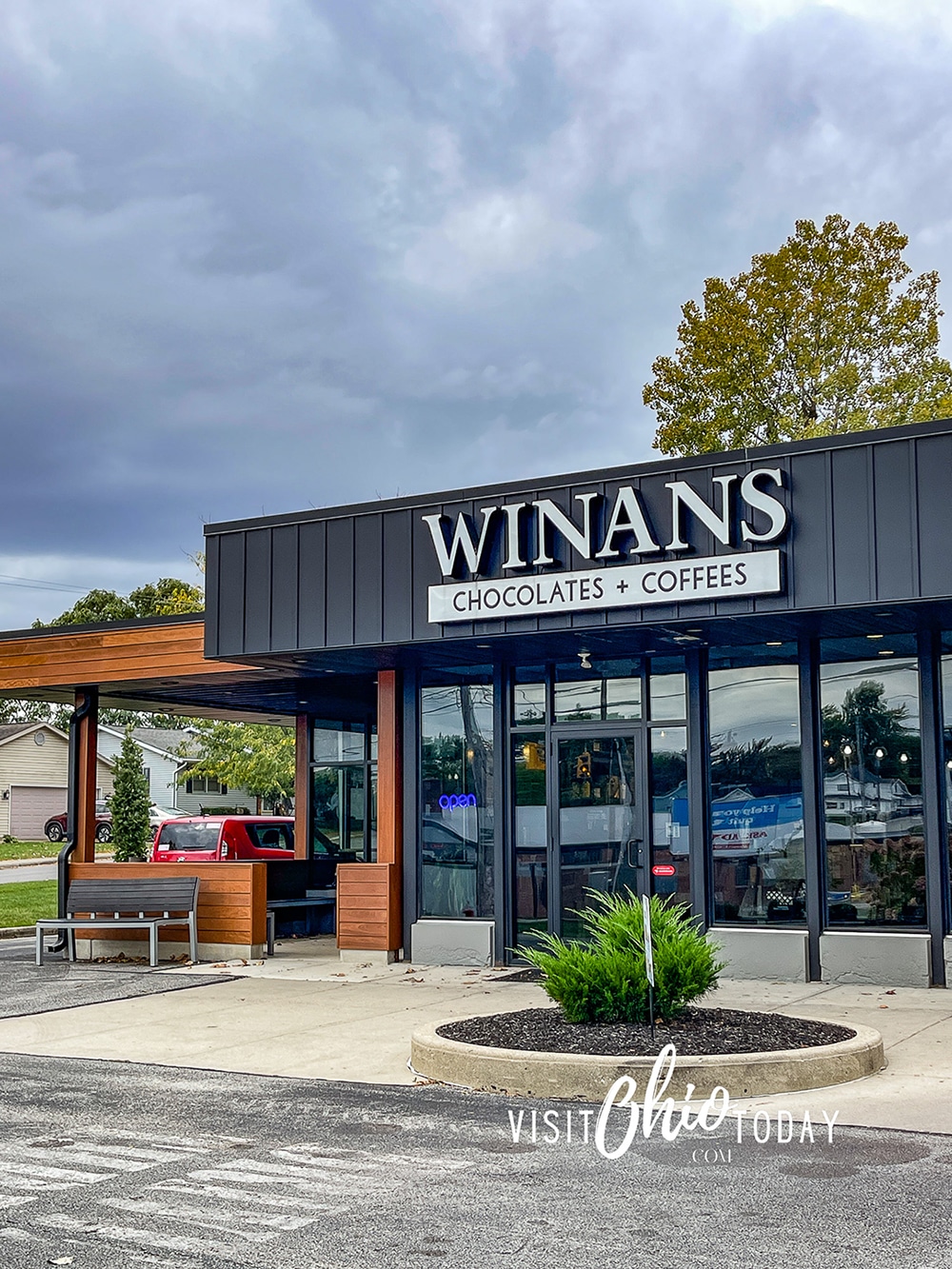 vertical photo of the outside of one of the Winans Chocolates restaurants