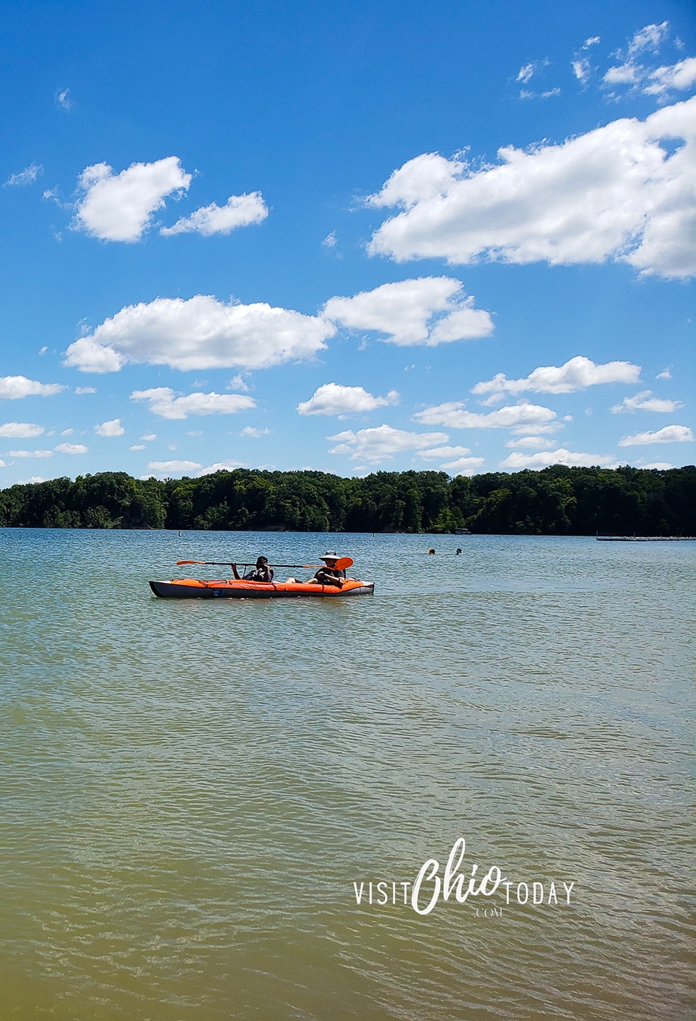 vertical photo of kayakers on the lake at Caesar Creek State Park. Photo credit: Cindy Gordon of VisitOhioToday.com